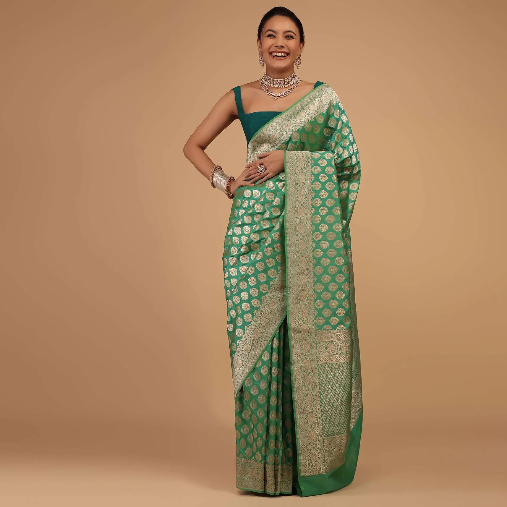 Atlantis Green Saree In Pure Banarasi Silk With A Summer Green Luminous Shade And Upada Zari Weave Floral Butti Work
