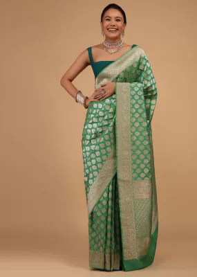 Atlantis Green Saree In Pure Banarasi Silk With A Summer Green Luminous Shade And Upada Zari Weave Floral Butti Work