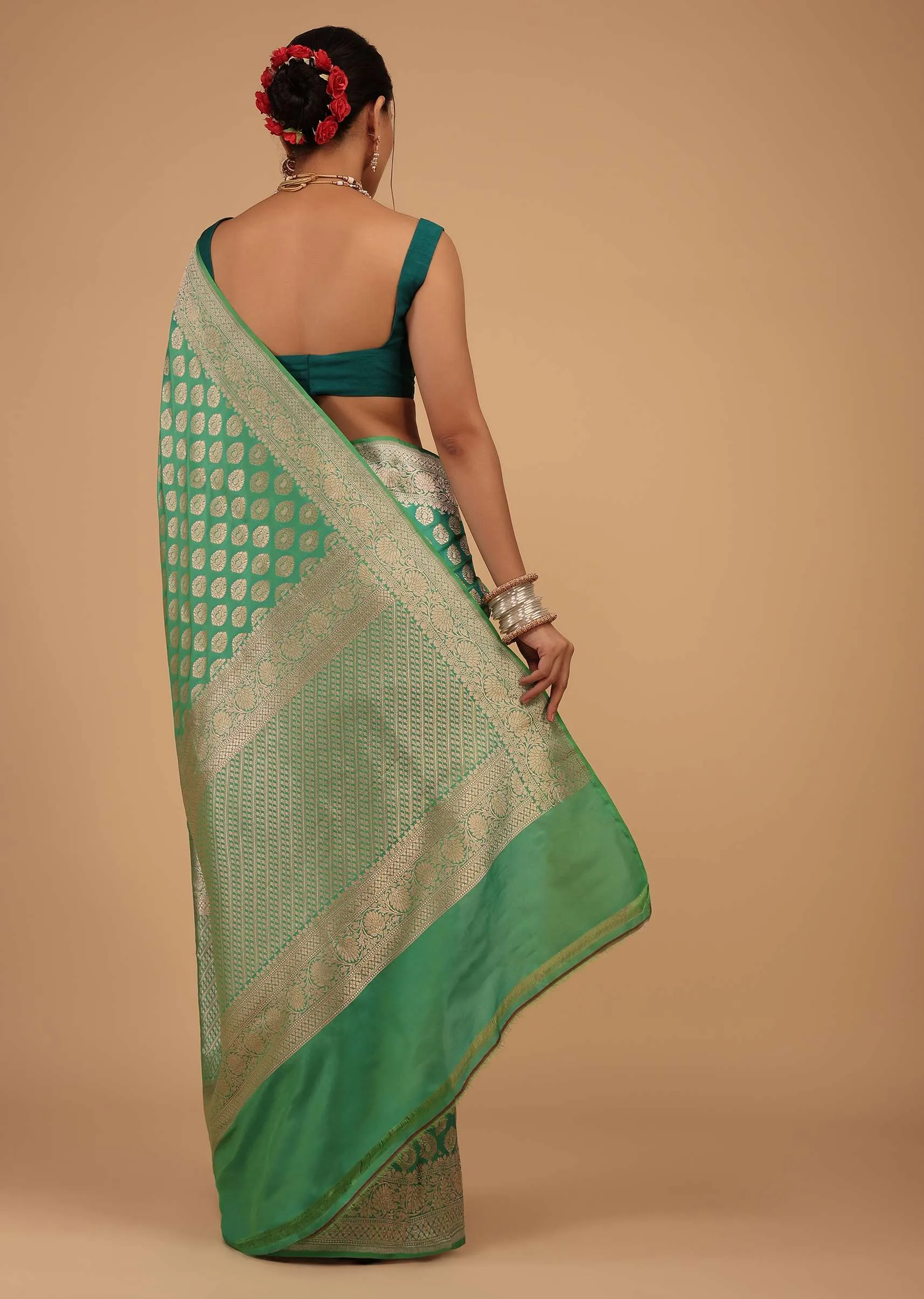 Atlantis Green Saree In Pure Banarasi Silk With A Summer Green Luminous Shade And Upada Zari Weave Floral Butti Work