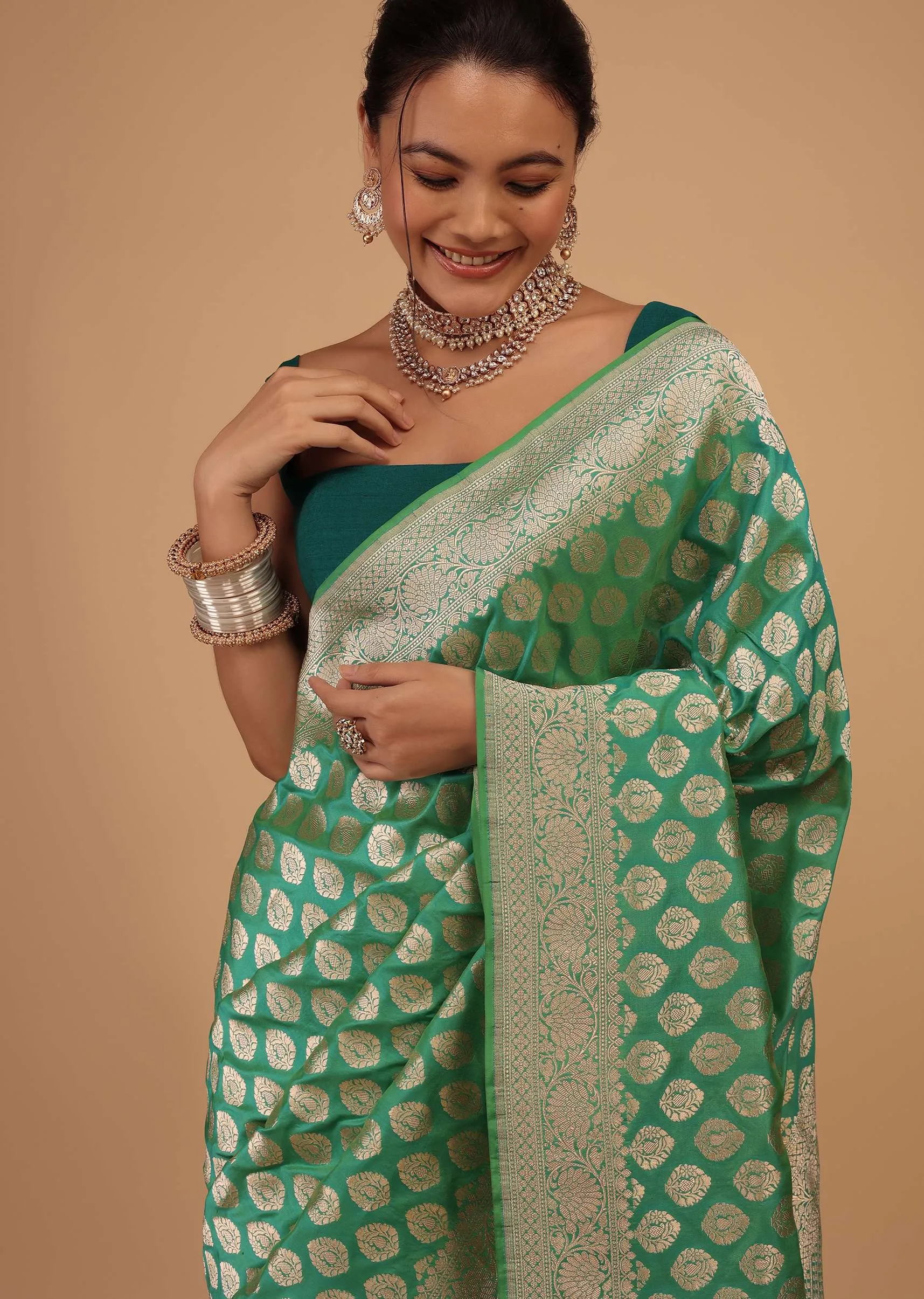 Atlantis Green Saree In Pure Banarasi Silk With A Summer Green Luminous Shade And Upada Zari Weave Floral Butti Work
