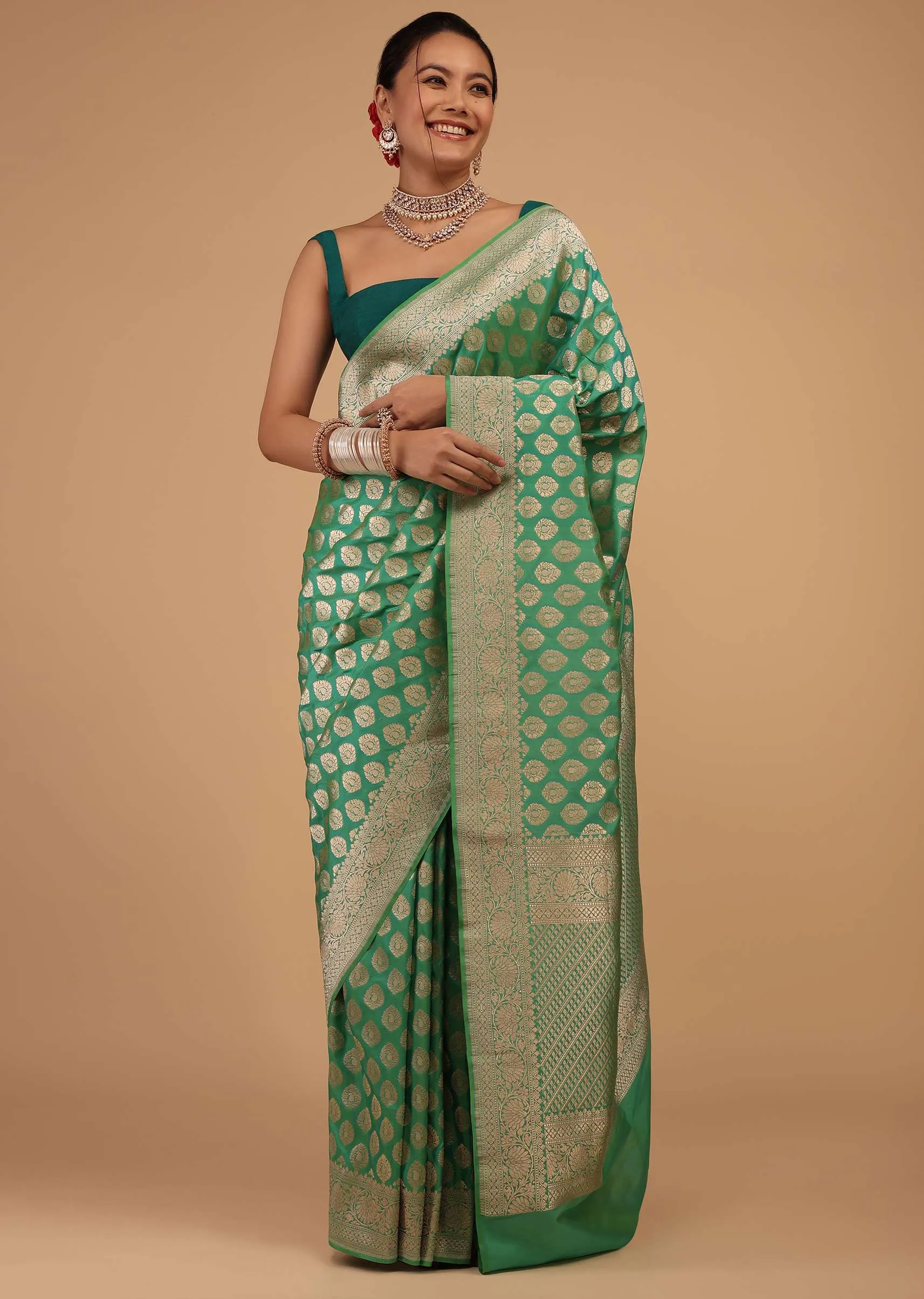Atlantis Green Saree In Pure Banarasi Silk With A Summer Green Luminous Shade And Upada Zari Weave Floral Butti Work